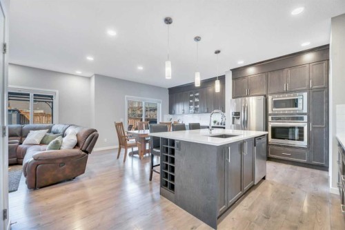 9 Mist Mountain Rise, Okotoks, AB - Indoor Photo Showing Kitchen With Upgraded Kitchen