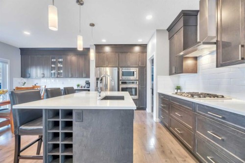 9 Mist Mountain Rise, Okotoks, AB - Indoor Photo Showing Kitchen With Upgraded Kitchen