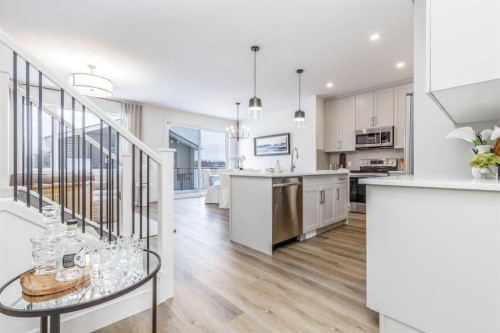 432 Rivercrest Road, Cochrane, AB - Indoor Photo Showing Kitchen With Upgraded Kitchen