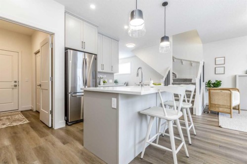 432 Rivercrest Road, Cochrane, AB - Indoor Photo Showing Kitchen With Stainless Steel Kitchen With Upgraded Kitchen