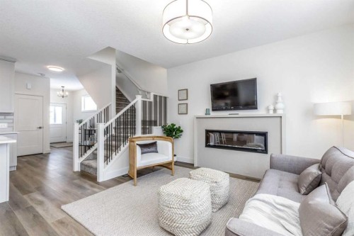 432 Rivercrest Road, Cochrane, AB - Indoor Photo Showing Living Room With Fireplace