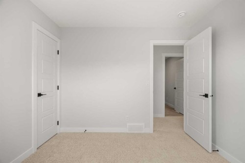 192 Belmont Place Sw, Calgary, AB - Indoor Photo Showing Other Room