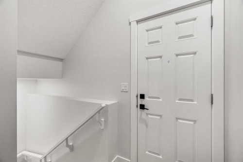192 Belmont Place Sw, Calgary, AB - Indoor Photo Showing Other Room