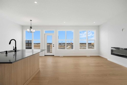 192 Belmont Place Sw, Calgary, AB - Indoor With Fireplace