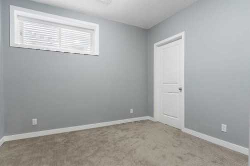 51 Sage Bank Court Nw, Calgary, AB - Indoor Photo Showing Other Room