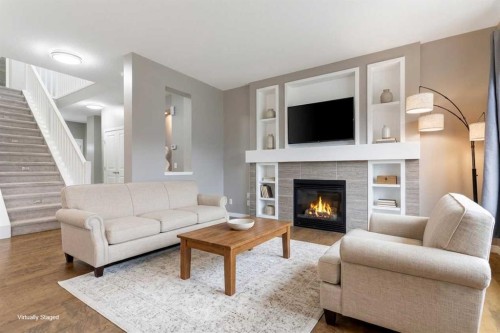 51 Sage Bank Court Nw, Calgary, AB - Indoor Photo Showing Living Room With Fireplace