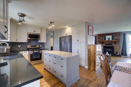 5338 5 Street West, Claresholm, AB - Indoor Photo Showing Kitchen With Double Sink
