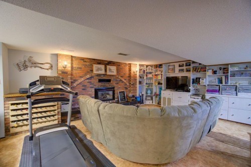 5338 5 Street West, Claresholm, AB - Indoor With Fireplace