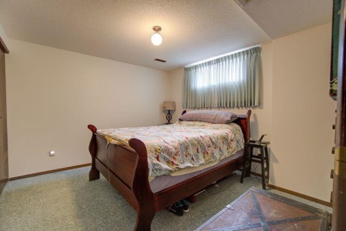 5338 5 Street West, Claresholm, AB - Indoor Photo Showing Bedroom