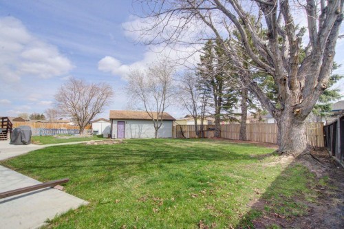 5338 5 Street West, Claresholm, AB - Outdoor With Backyard