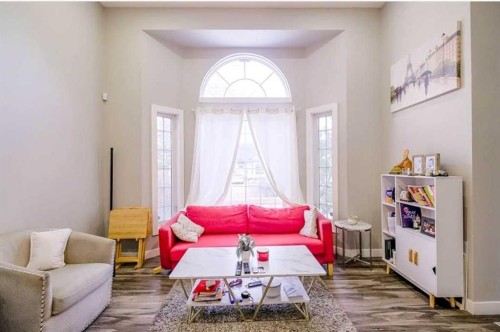 6923 Laguna Way Ne, Calgary, AB - Indoor Photo Showing Living Room