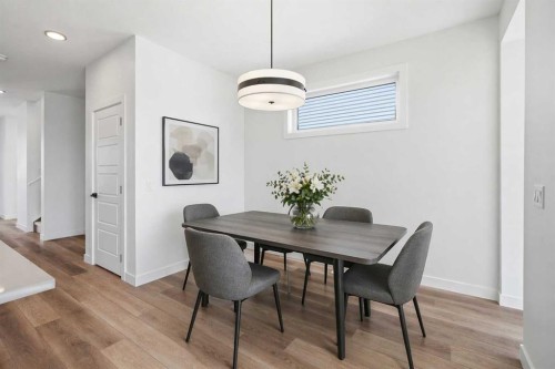 201 Bridgeport Gate, Chestermere, AB - Indoor Photo Showing Dining Room