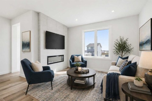 201 Bridgeport Gate, Chestermere, AB - Indoor Photo Showing Living Room With Fireplace