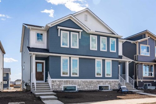 201 Bridgeport Gate, Chestermere, AB - Outdoor With Facade