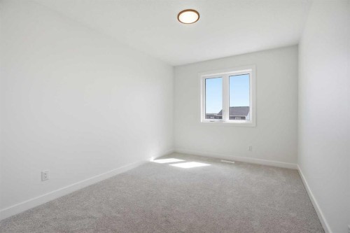 201 Bridgeport Gate, Chestermere, AB - Indoor Photo Showing Other Room