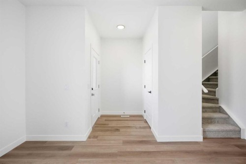 201 Bridgeport Gate, Chestermere, AB - Indoor Photo Showing Other Room