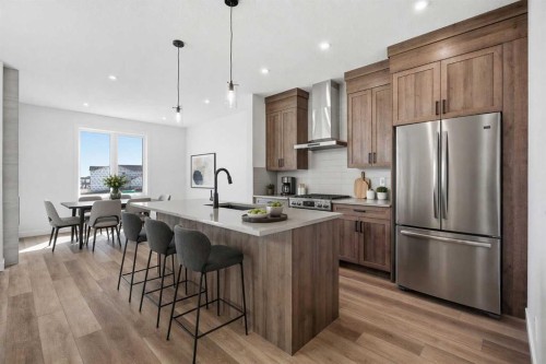 201 Bridgeport Gate, Chestermere, AB - Indoor Photo Showing Kitchen With Upgraded Kitchen