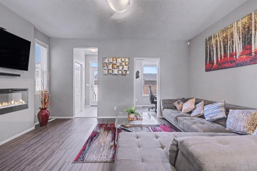 186 Cornerstone Avenue Ne, Calgary, AB - Indoor Photo Showing Living Room With Fireplace