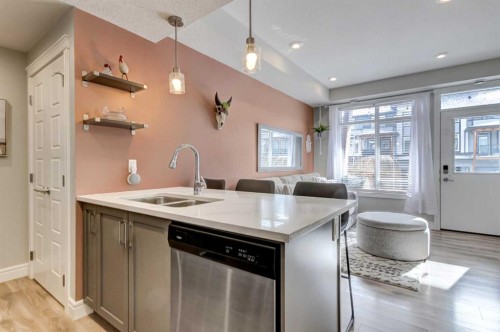 15-230 Seton Passage, Calgary, AB - Indoor Photo Showing Kitchen With Double Sink