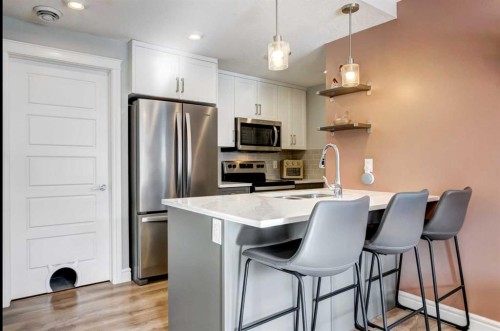 15-230 Seton Passage, Calgary, AB - Indoor Photo Showing Kitchen With Upgraded Kitchen