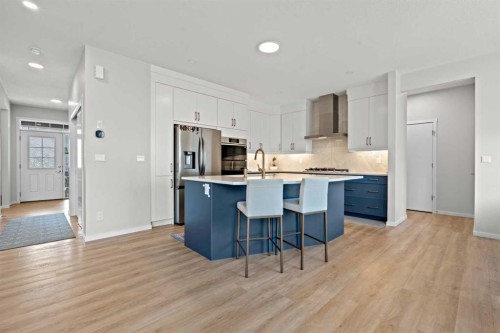 12 Southwinds Common Sw, Airdrie, AB - Indoor Photo Showing Kitchen With Stainless Steel Kitchen With Upgraded Kitchen