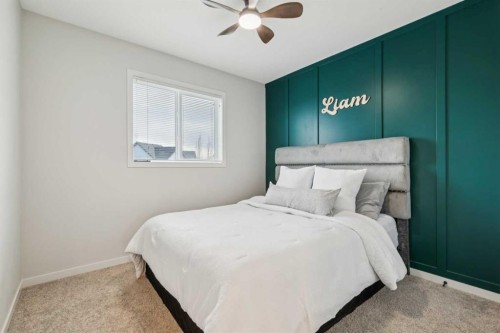 325 Marquis Heights Se, Calgary, AB - Indoor Photo Showing Bedroom