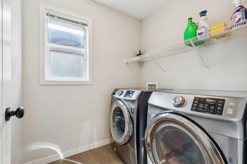 325 Marquis Heights Se, Calgary, AB - Indoor Photo Showing Laundry Room