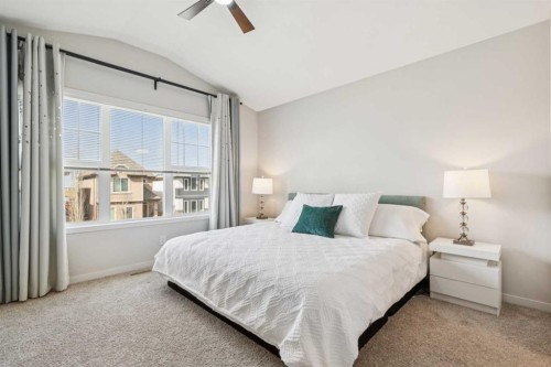 325 Marquis Heights Se, Calgary, AB - Indoor Photo Showing Bedroom