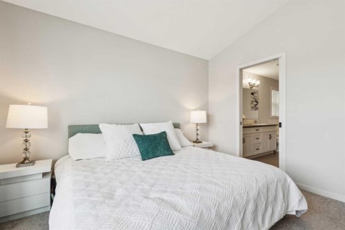 325 Marquis Heights Se, Calgary, AB - Indoor Photo Showing Bedroom