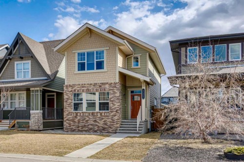 325 Marquis Heights Se, Calgary, AB - Outdoor With Deck Patio Veranda With Facade