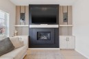 325 Marquis Heights Se, Calgary, AB  - Indoor Photo Showing Living Room With Fireplace 