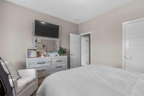 811-250 Fireside View, Cochrane, AB - Indoor Photo Showing Bedroom