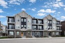 811-250 Fireside View, Cochrane, AB  - Outdoor With Balcony With Facade 