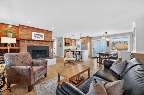 8927 48 Avenue Nw, Calgary, AB - Indoor Photo Showing Living Room With Fireplace