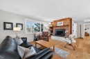 8927 48 Avenue Nw, Calgary, AB  - Indoor Photo Showing Living Room With Fireplace 