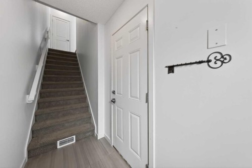 8 Walden Walk Se, Calgary, AB - Indoor Photo Showing Other Room