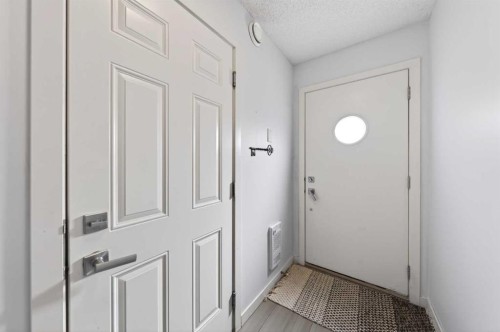 8 Walden Walk Se, Calgary, AB - Indoor Photo Showing Bedroom