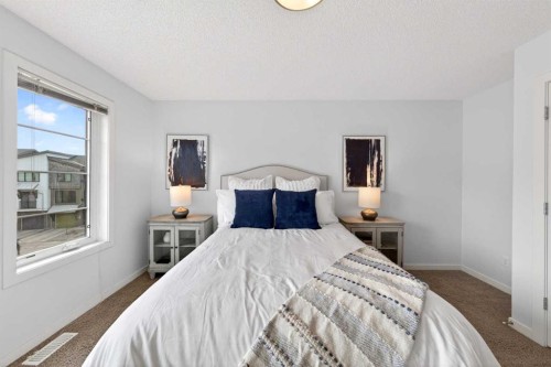 8 Walden Walk Se, Calgary, AB - Indoor Photo Showing Bedroom