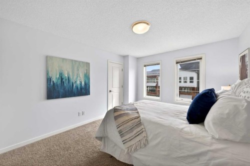8 Walden Walk Se, Calgary, AB - Indoor Photo Showing Bedroom