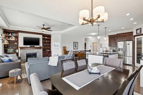 101 Sheep River Crest, Okotoks, AB - Indoor With Fireplace