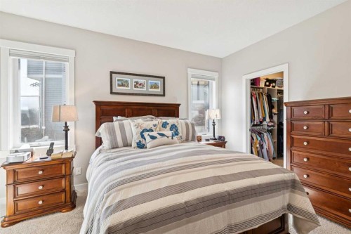 101 Sheep River Crest, Okotoks, AB - Indoor Photo Showing Bedroom