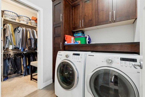 101 Sheep River Crest, Okotoks, AB - Indoor Photo Showing Laundry Room