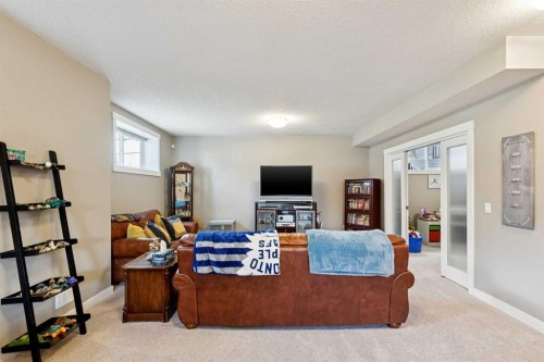 101 Sheep River Crest, Okotoks, AB - Indoor Photo Showing Bedroom