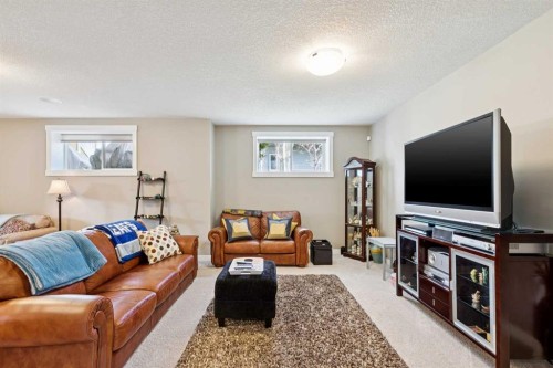 101 Sheep River Crest, Okotoks, AB - Indoor Photo Showing Living Room