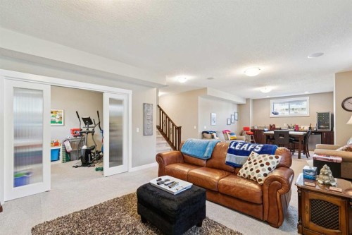 101 Sheep River Crest, Okotoks, AB - Indoor Photo Showing Living Room