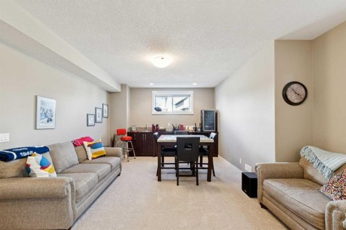 101 Sheep River Crest, Okotoks, AB - Indoor Photo Showing Living Room