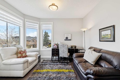 101 Sheep River Crest, Okotoks, AB - Indoor Photo Showing Living Room