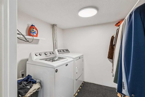 2211 Bowness Road Nw, Calgary, AB - Indoor Photo Showing Laundry Room