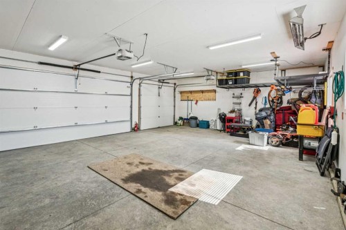 54 Elgin Meadows Green Se, Calgary, AB - Indoor Photo Showing Garage