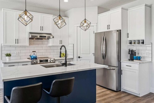54 Elgin Meadows Green Se, Calgary, AB - Indoor Photo Showing Kitchen With Upgraded Kitchen